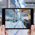 Workflow in der Produktion. Auf einem Tablet wird das Bild der Produktion gezeigt. Darüber liegt das Schema eines Workflows.